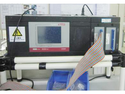 Electronic test machine